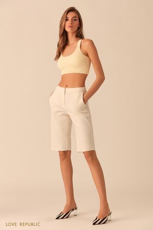 

Желтый укороченный топ из трикотажа в рубчик