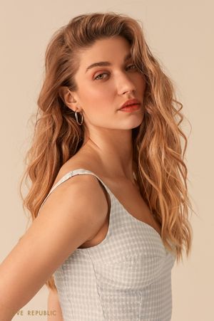 Набор сережек-колец из витого металла фото