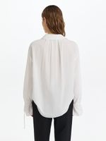 Блузка с расклешенными манжетами