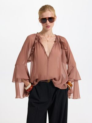 

Шифоновая блузка с воланами