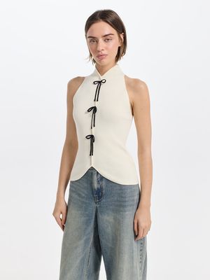 

Трикотажный топ-халтер с бантами