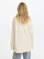 Свитер свободного кроя