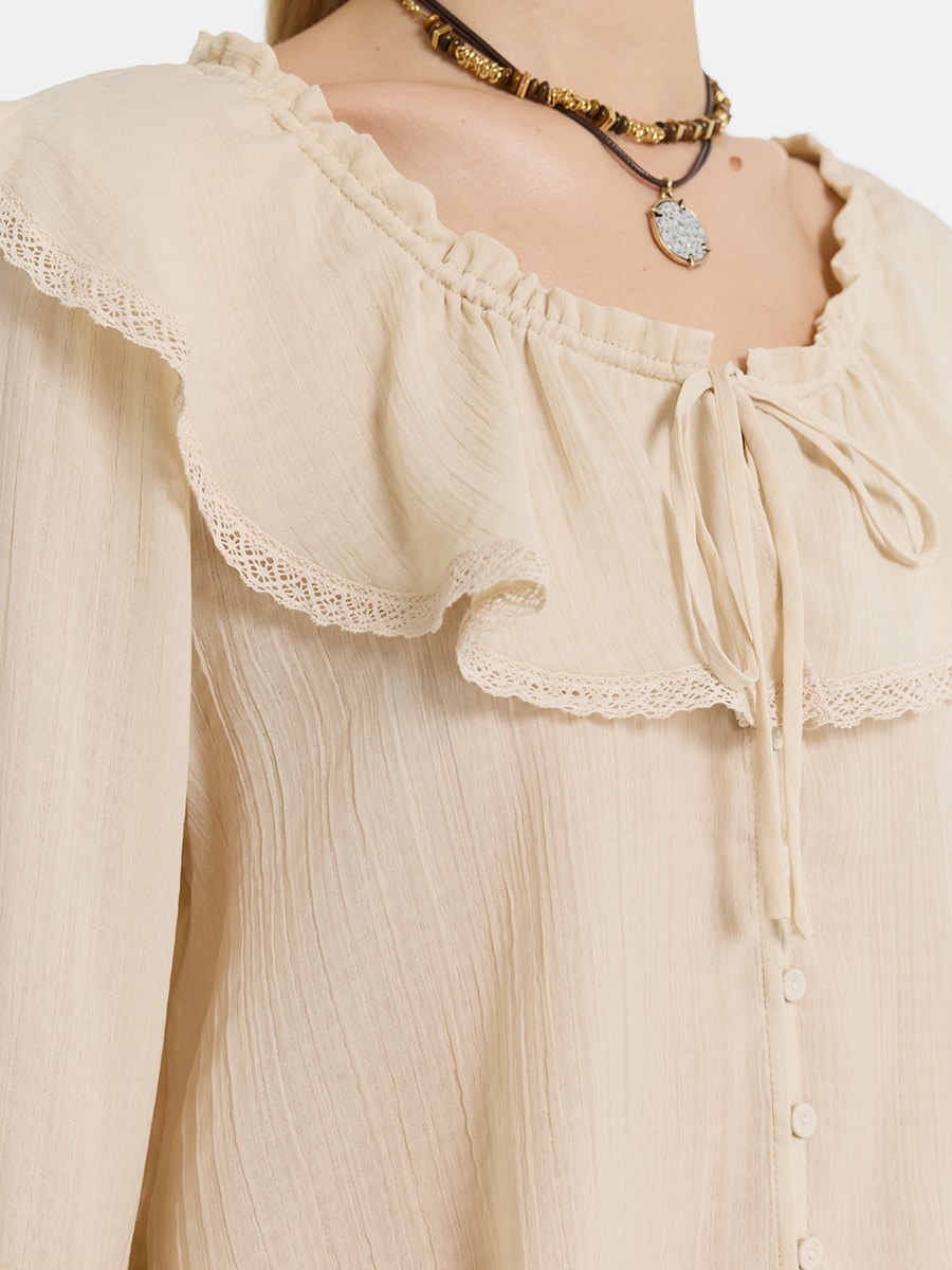 Блузка с оборками и воланами