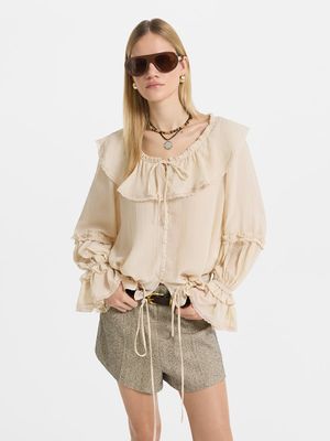 

Блузка с оборками и воланами