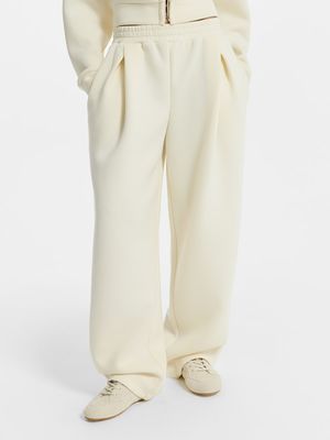 

Трикотажные брюки с защипами