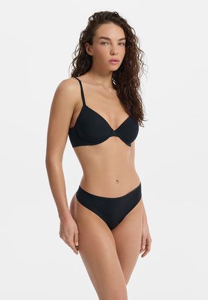 

Бесшовные трусы-танга из микрофибры