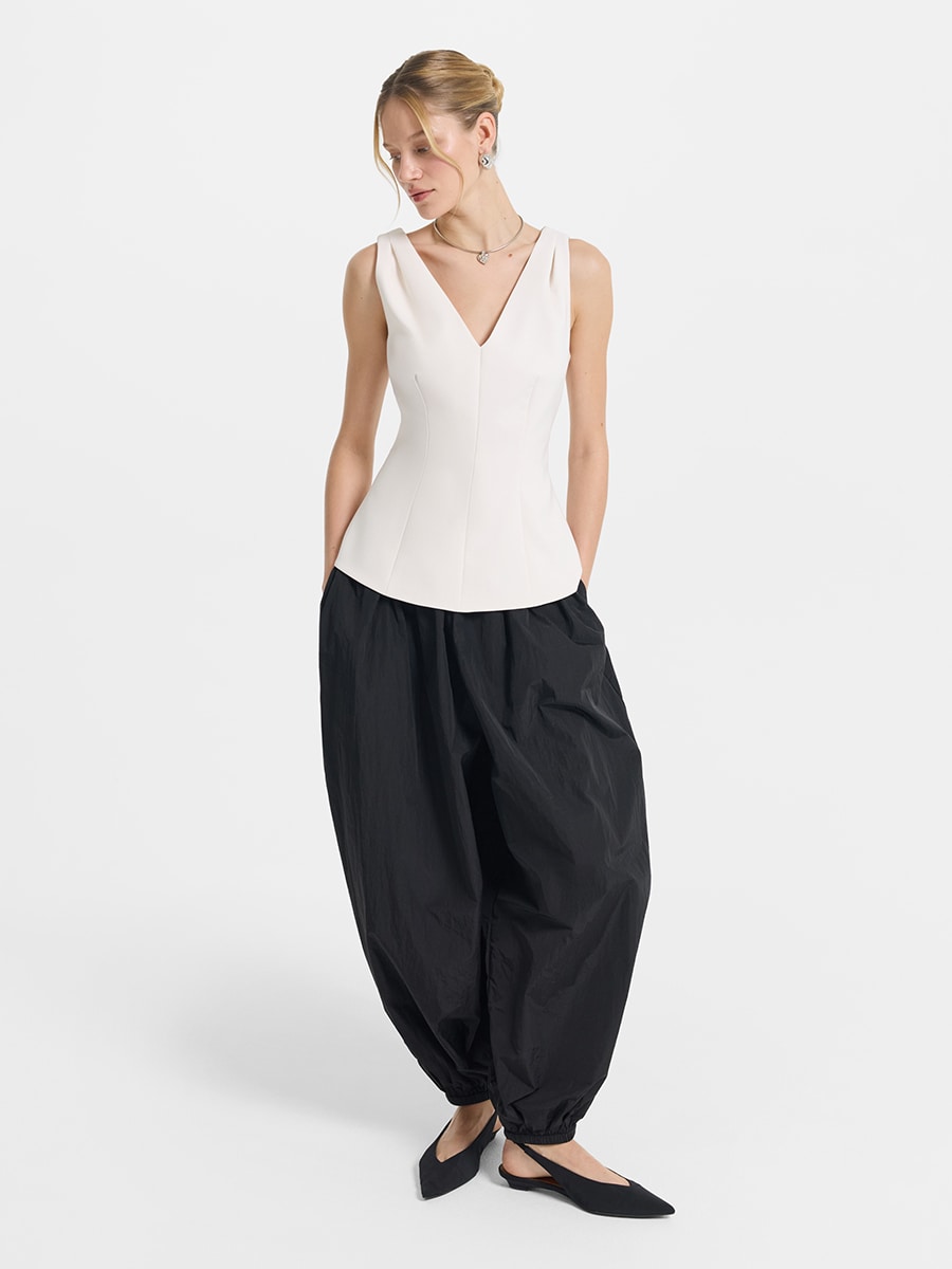 Приталенный топ с баской