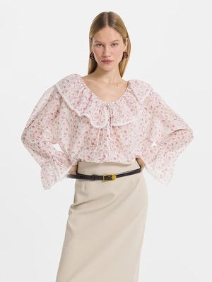 

Шифоновая блузка с воланами